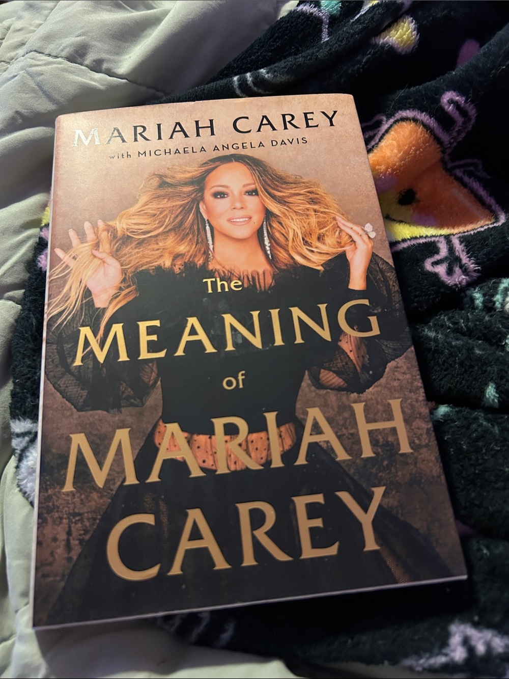 The Meaning of Mariah Carey by Mariah Carey - Gold & Black Cover